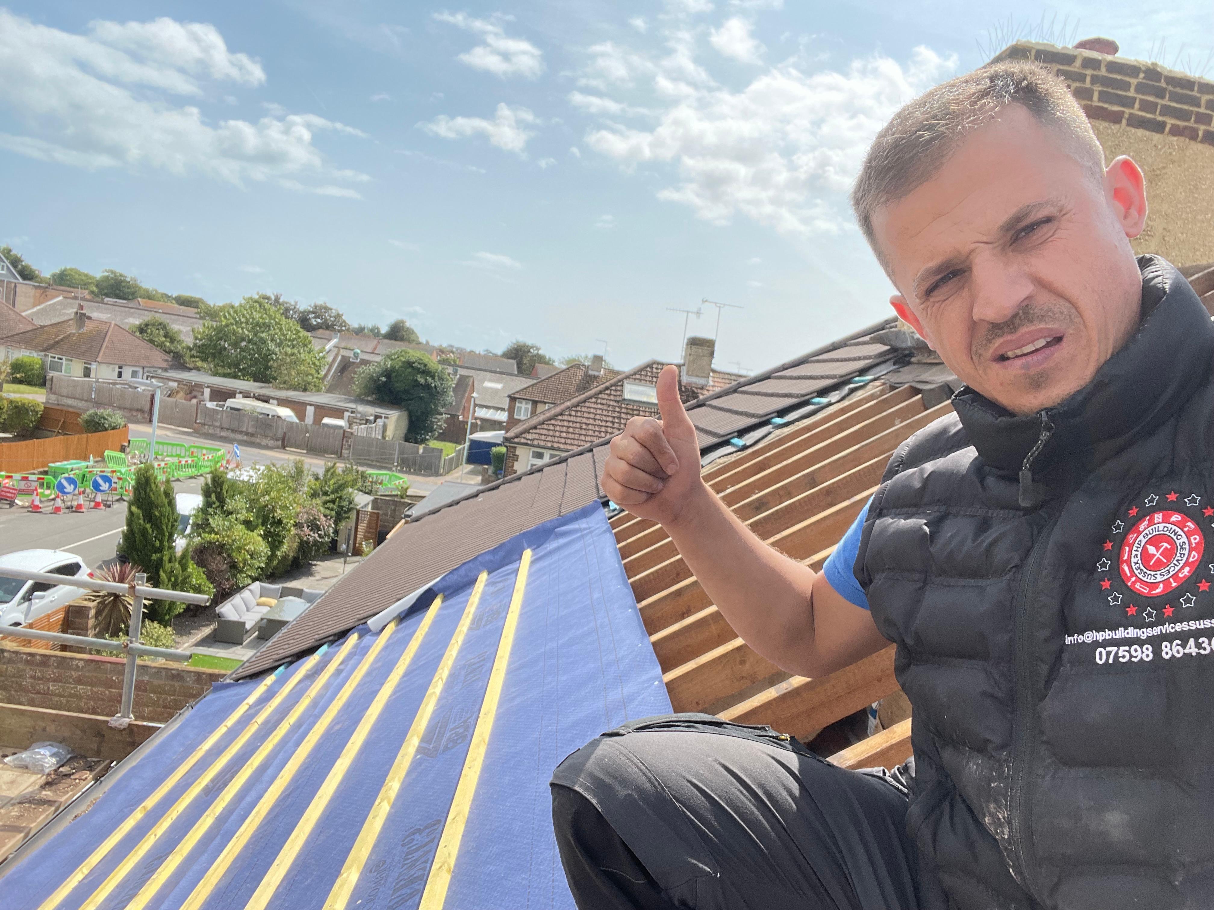 HP Building Services Sussex team member on site